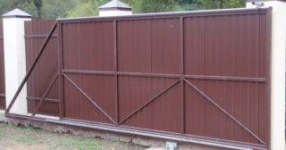 Купить откатные ворота из профнастила Воркута, цена от 1735 руб.
