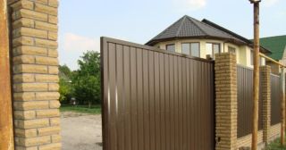 Купить откатные ворота из профнастила Воркута, цена от 1735 руб.
